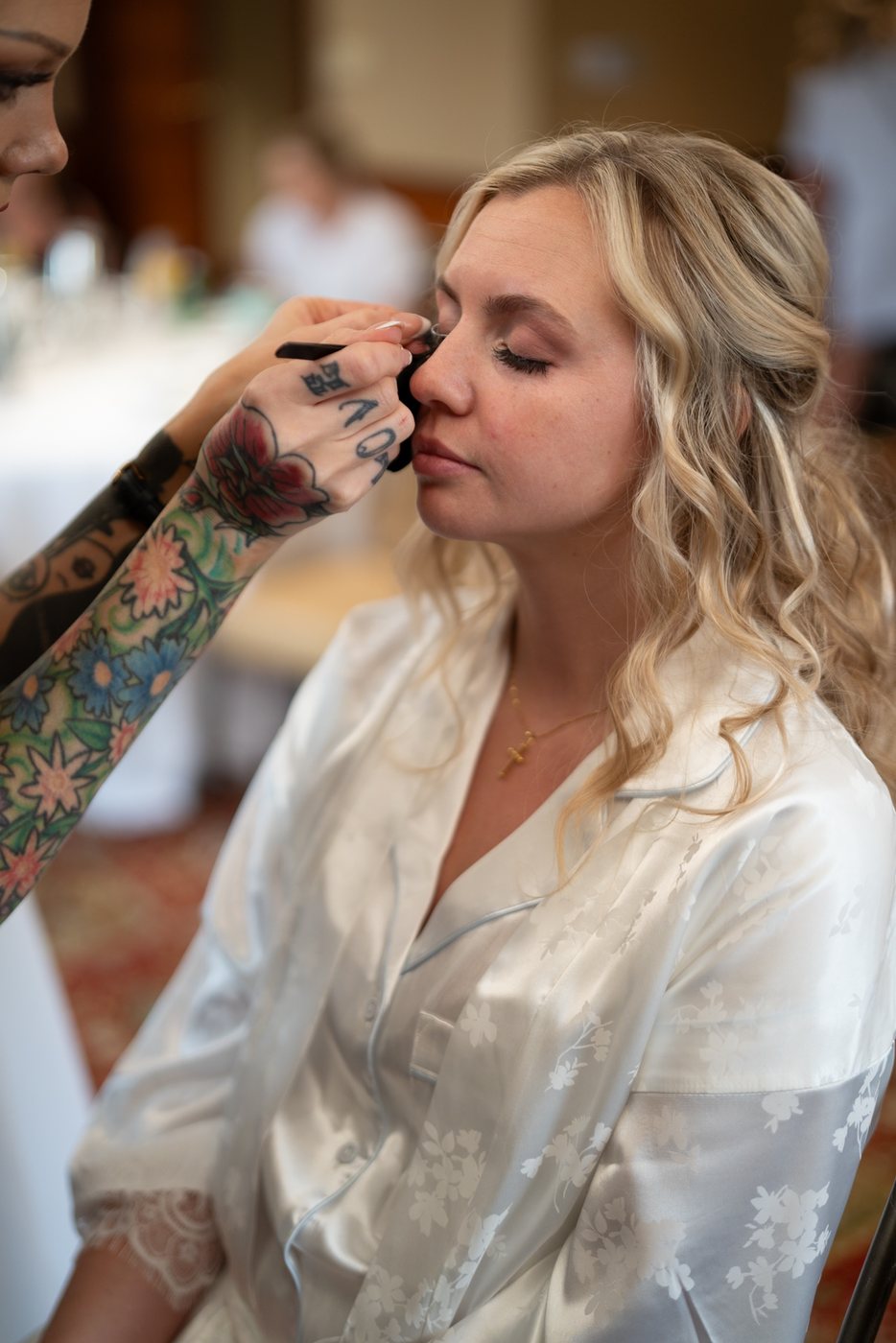Bride during makeup preparation, before editing; photograph by Michele Maloney