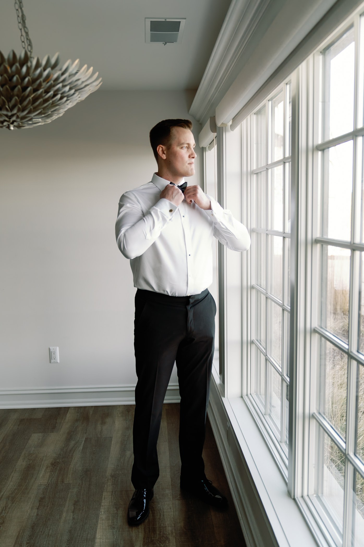 16 / Groom by the Window — After editing