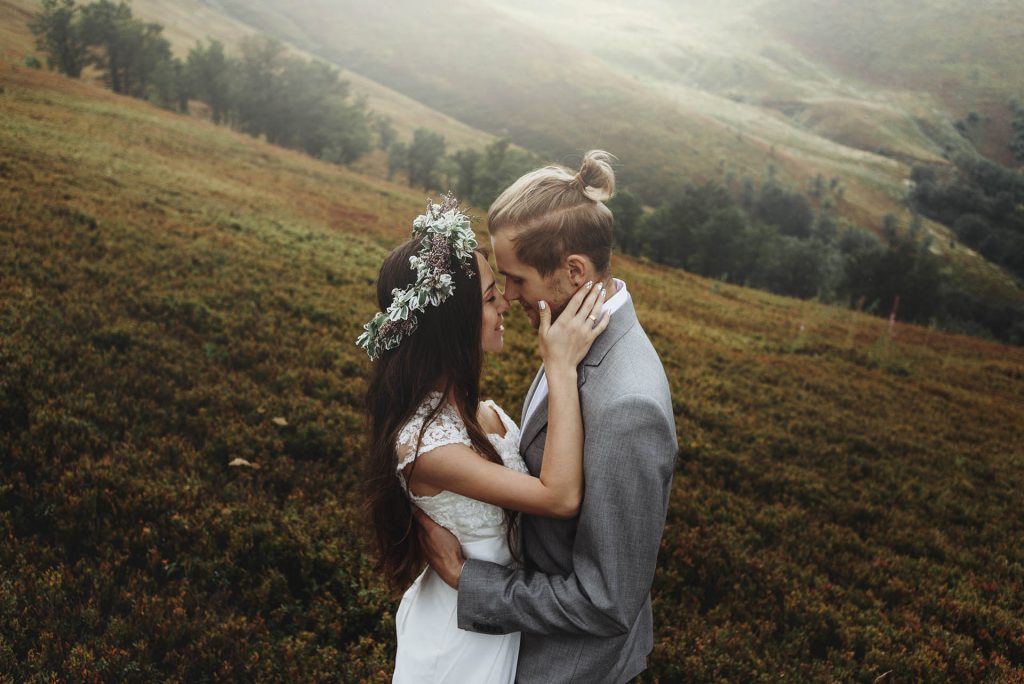beautiful fabulous happy bride and stylish groom on the backgro